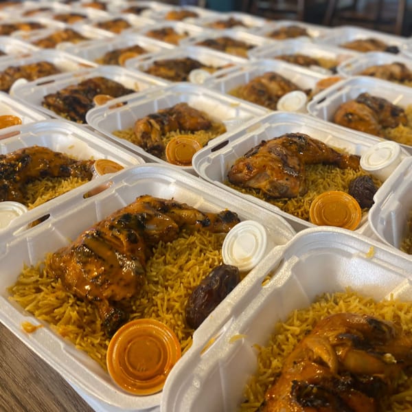 Rows of Port of Peri Peri chicken and rice meals in white takeout containers, with sauces and dates.